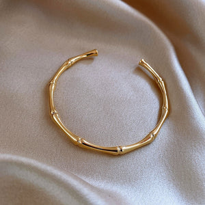 Pulsera femenina de temperamento dorado flameado