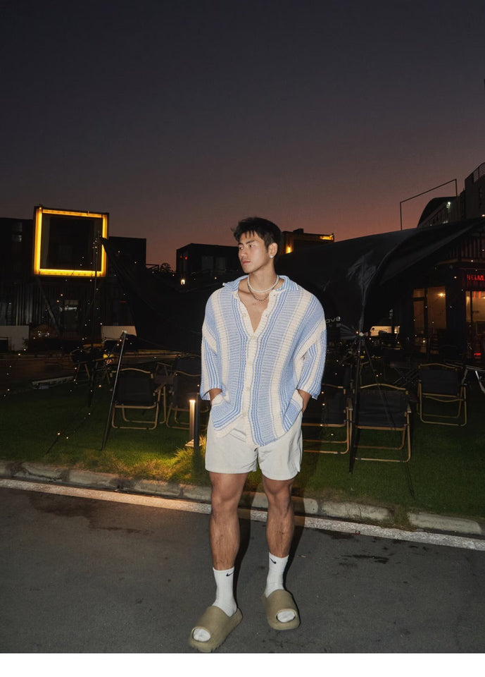 Top fino de punto informal con solapas sueltas de verano