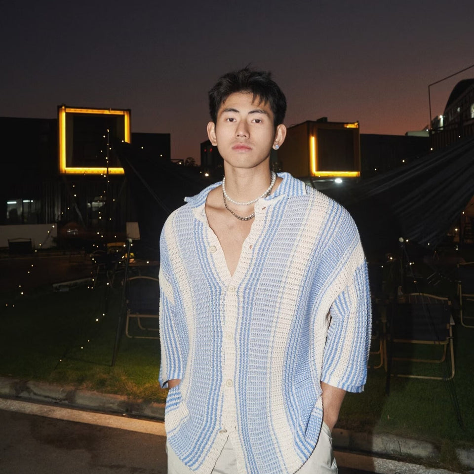 Top fino de punto informal con solapas sueltas de verano