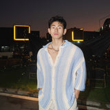 Top fino de punto informal con solapas sueltas de verano